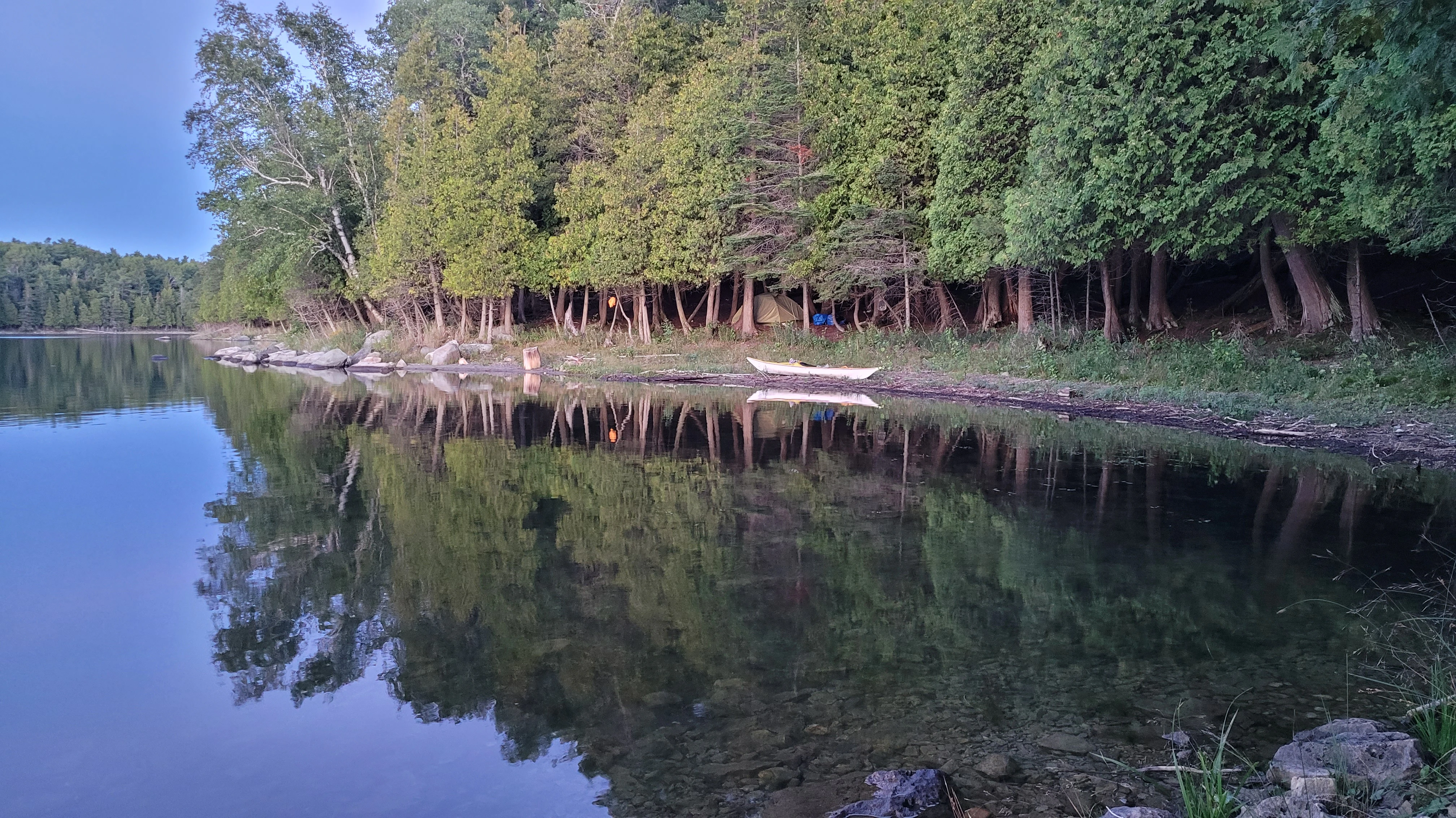 Sea kayak camping in Snug Harbor Killarney Bay Ontario Canada